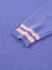 Close-up of a blue fabric with pink stitching detail
