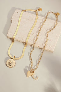 A close up view of Cara Charm Necklace 
