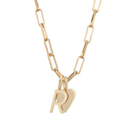 A gold-plated charm necklace with an elongated link chain and two pendants, one shaped like a heart and the other like a small pendant, attached to the chain.