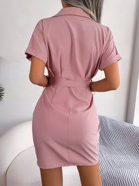 Pink dress worn by a person with a neutral background
