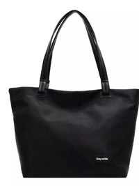 Black tote bag with a visible brand label on a white background