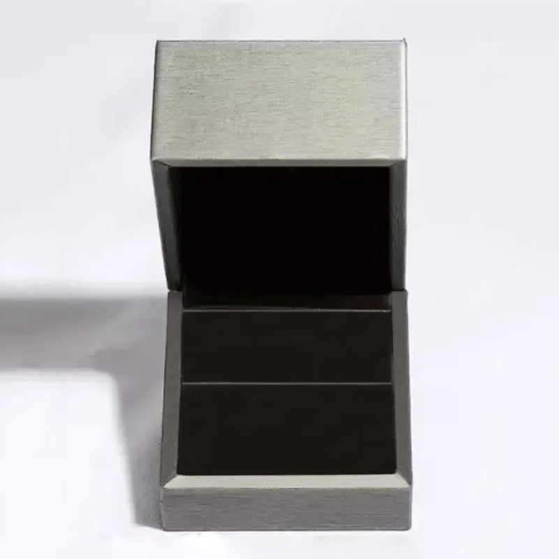 Metallic gray rectangular box with a lid on a white background