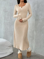 Woman wearing a beige ribbed dress with white fur-lined boots against a gray background