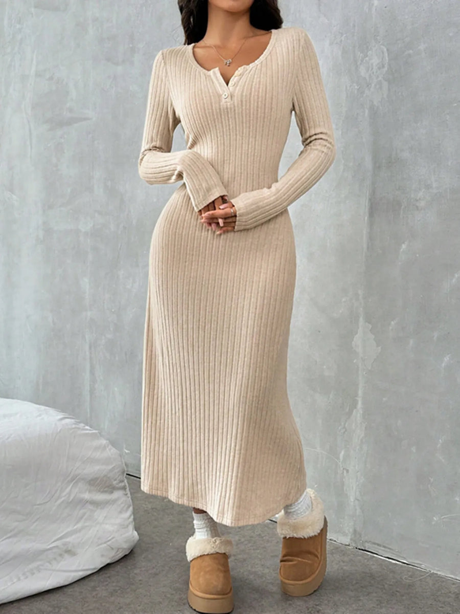 Woman wearing a beige ribbed dress with white fur-lined boots against a gray background