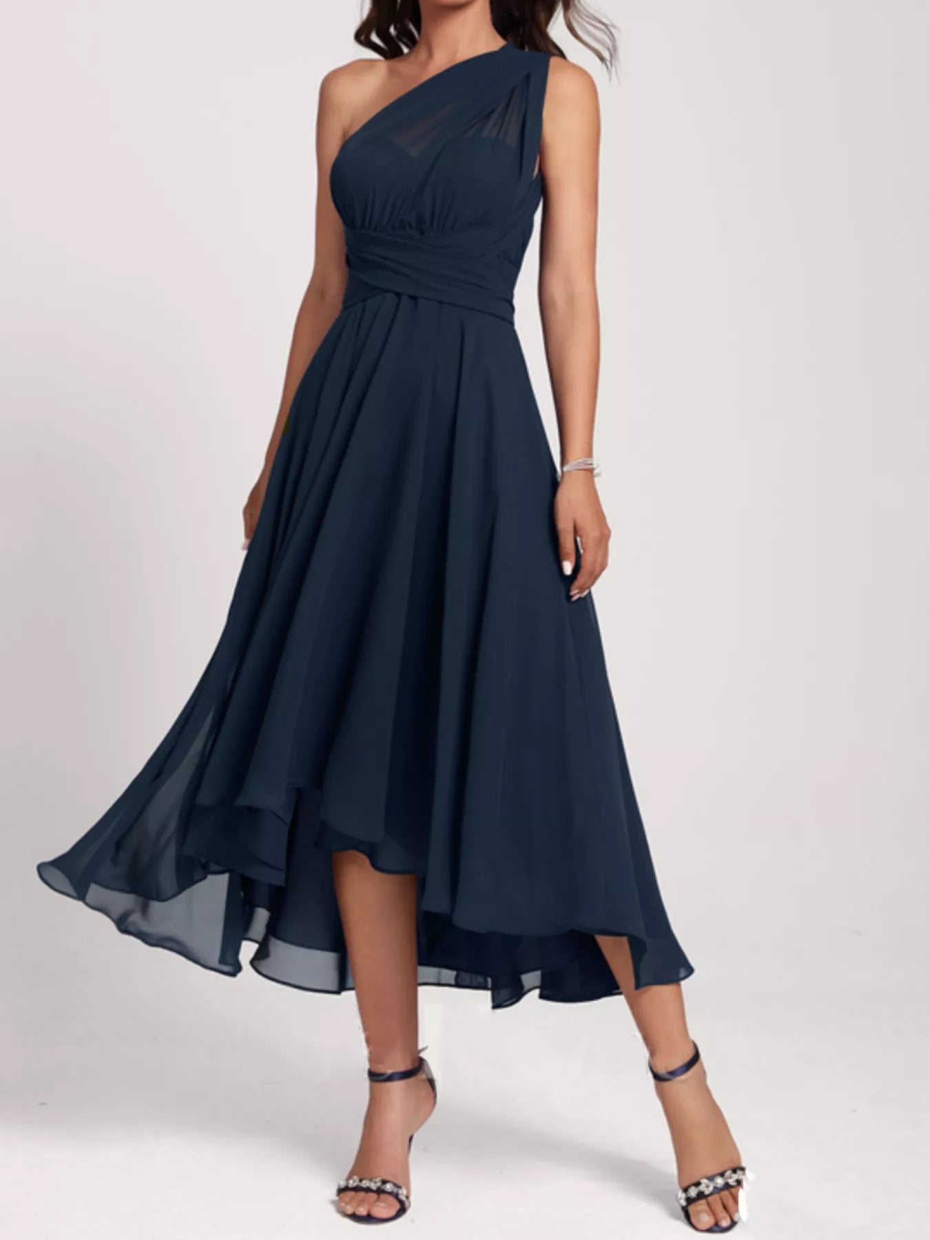 Navy blue one-shoulder dress on a white background