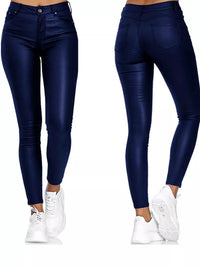Navy blue leggings worn by a person on a white background