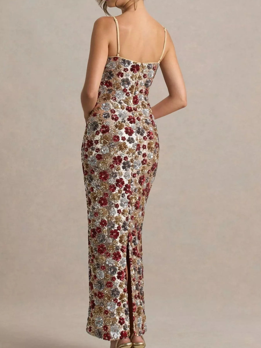 Woman wearing a floral dress with a beige background