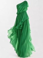 A close up view of green One-Shoulder Ruffled Chiffon Maxi Dress on a white background