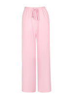 Pink pajama pants on a white background
