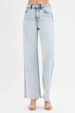 Light blue jeans on a white background