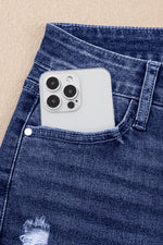 Phone case with camera lens design in a pocket of blue jeans
