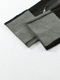 Two gray fabric pouches with zippers on a white background