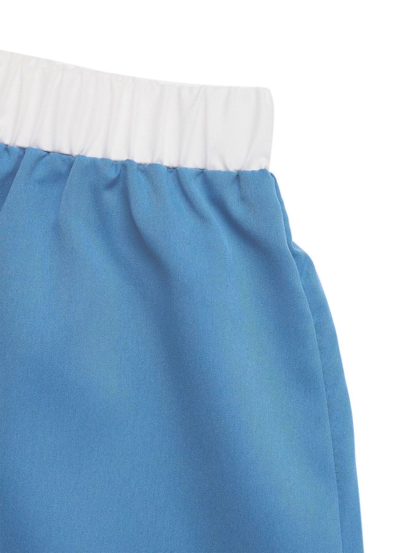 Blue skirt with white waistband on a white background