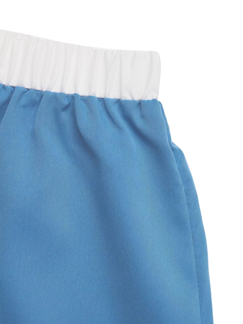 Blue skirt with white waistband on a white background
