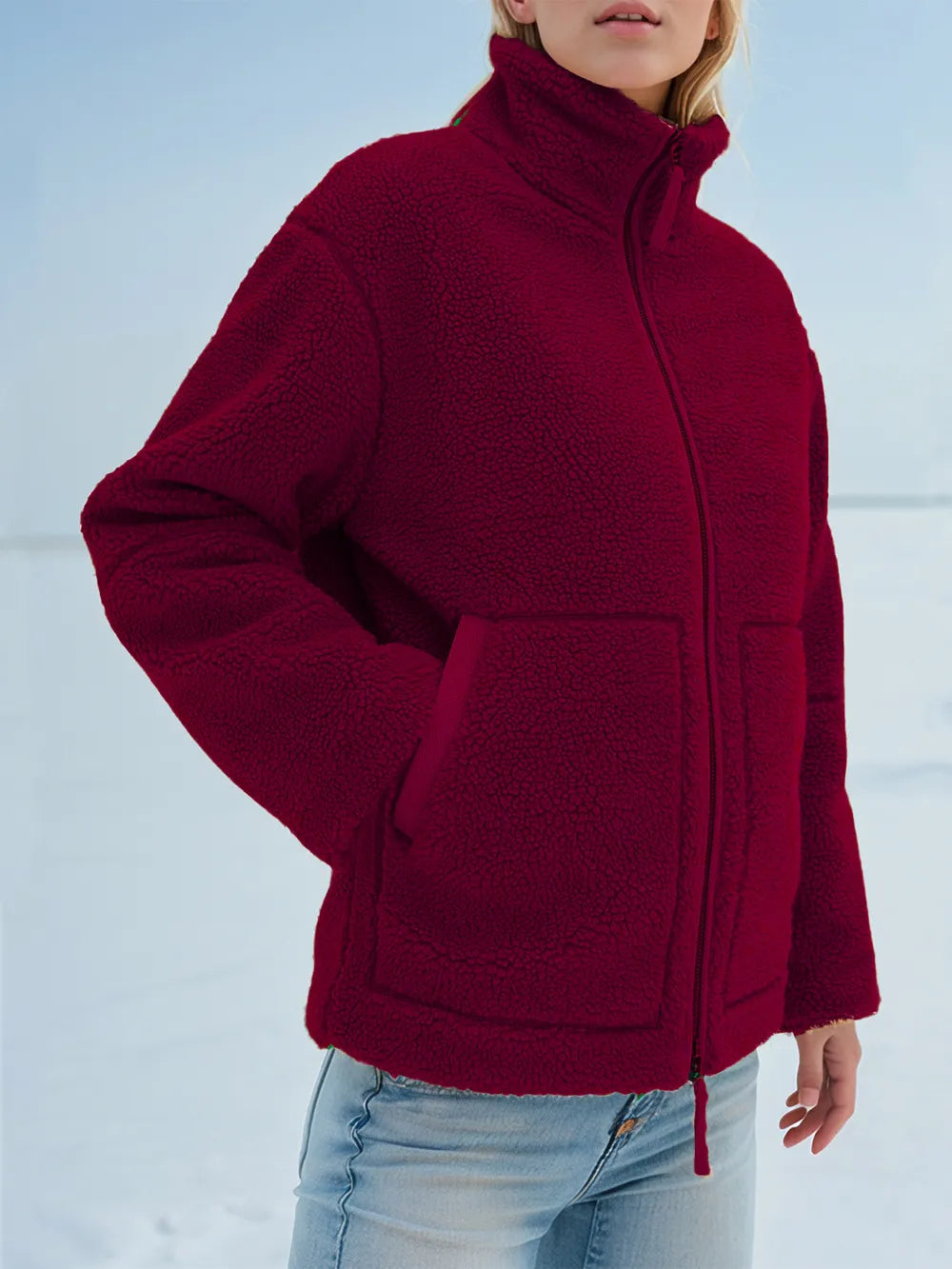 Person wearing a red jacket with a white background