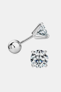 Pair of diamond stud earrings on a white background