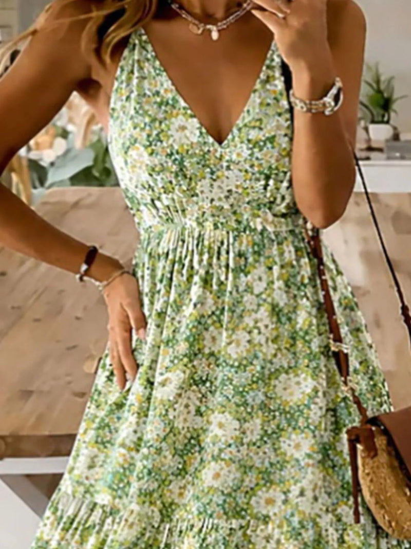 Woman wearing a floral dress in an indoor setting