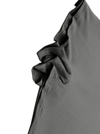 Close-up of a gray garment with a ruffled detail on a white background