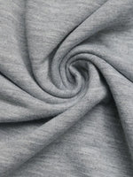 Close-up of gray fabric with a swirl pattern