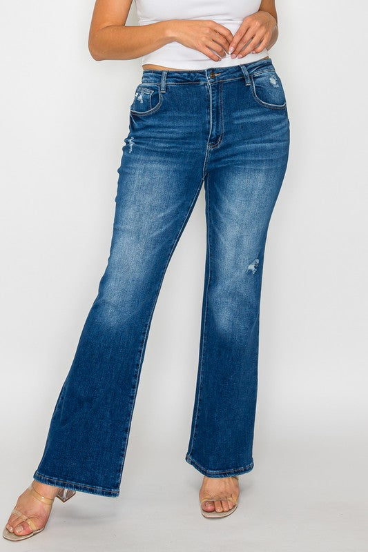 Close up view of plus size bytos Full Size High Rise Bootcut Jeans with Pockets