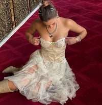 Model sitting down wearing Curb Chain & Heart Pendant Necklace