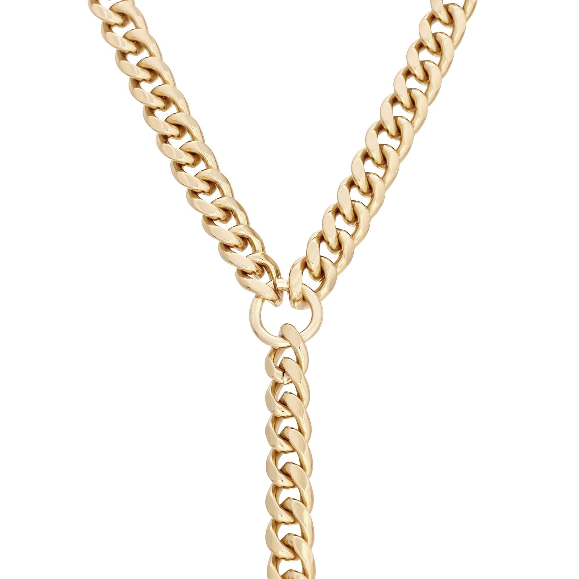 A gold curb chain lariat necklace with a lobster clasp closure.