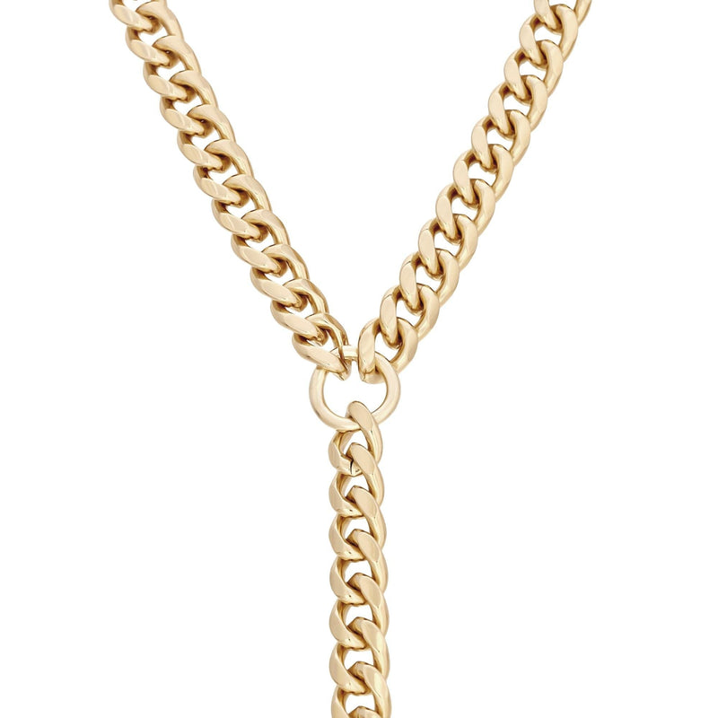 A gold curb chain lariat necklace with a lobster clasp closure.