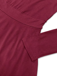 Close-up of a maroon shirt with a white background