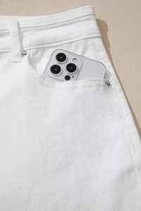 Smartphone with camera module sticking out of a white pocket