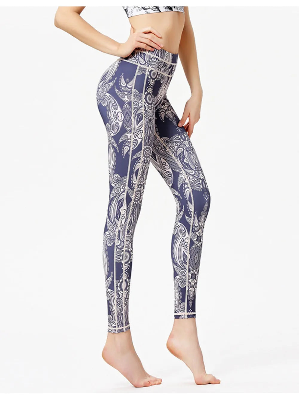 Patterned leggings worn by a person on a white background