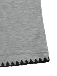 Gray fabric with black lace trim on a white background