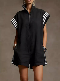 Black sleeveless top and shorts with white stripes on a brown background
