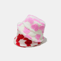 Floral-patterned headband with pink, white, and red colors on a white background