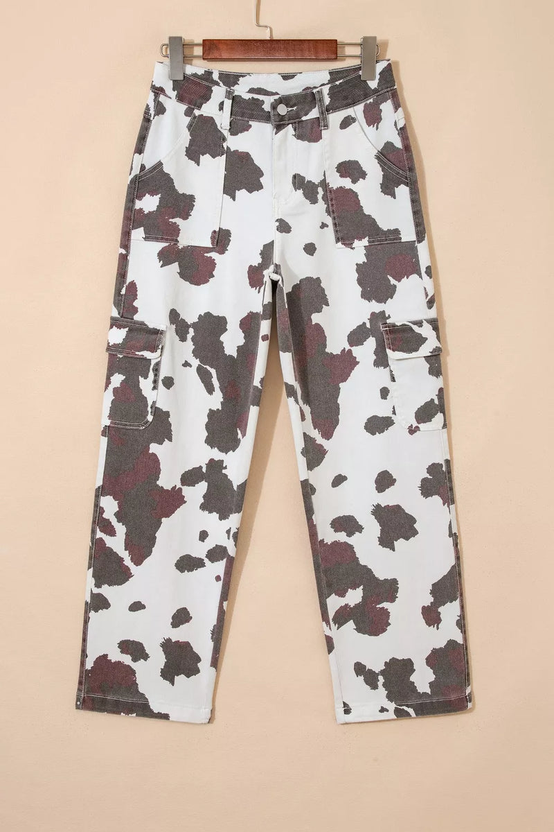 Cow print pants on a beige background
