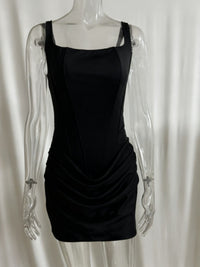 Black dress on a transparent mannequin against a white background