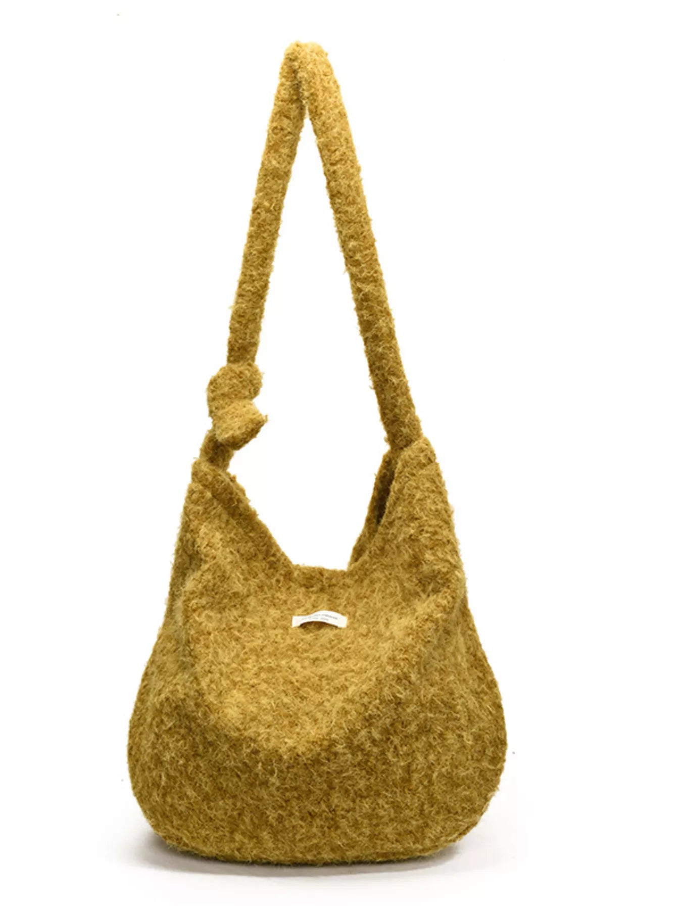 Yellow textured handbag with a handle on a white background