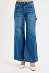 Blue wide-leg jeans on a white background