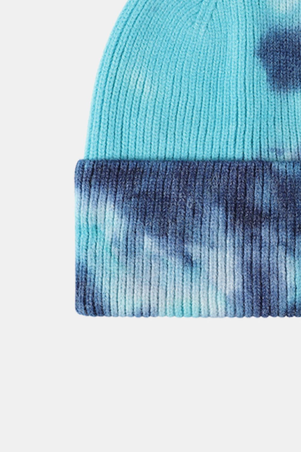 Blue and gray gradient beanie on a white background