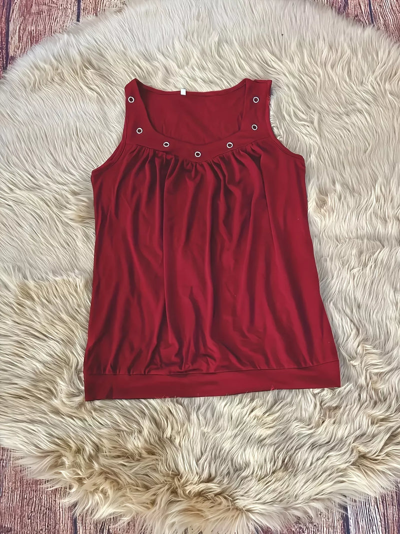 Red tank top on a fluffy white rug