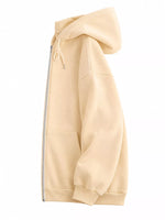 A light beige zip-up hoodie shown from a side profile view against a solid white background.