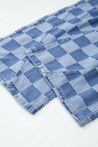 Blue checkered fabric on a white background