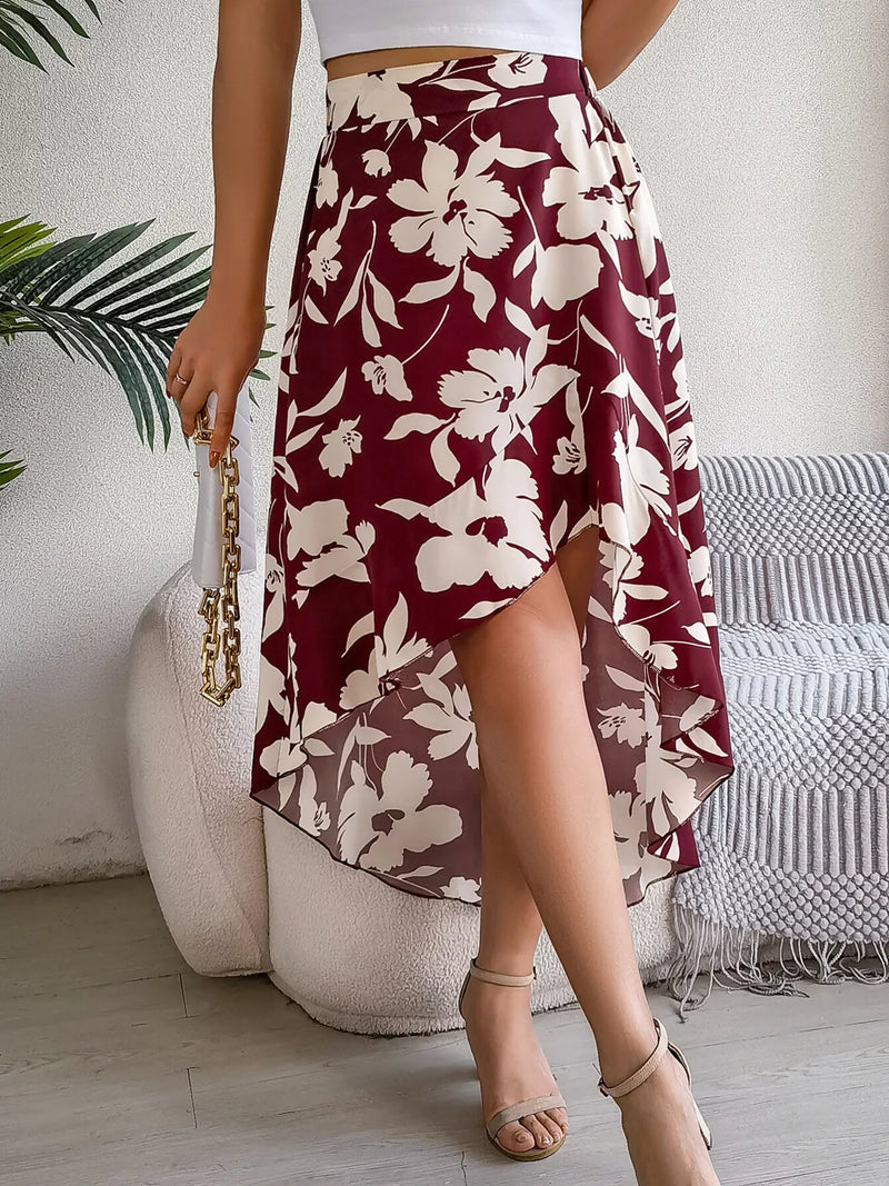 Woman wearing a burgundy floral skirt in an indoor setting