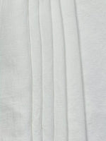 Close-up of light gray fabric texture