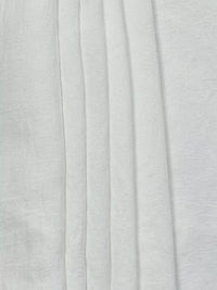 Close-up of light gray fabric texture