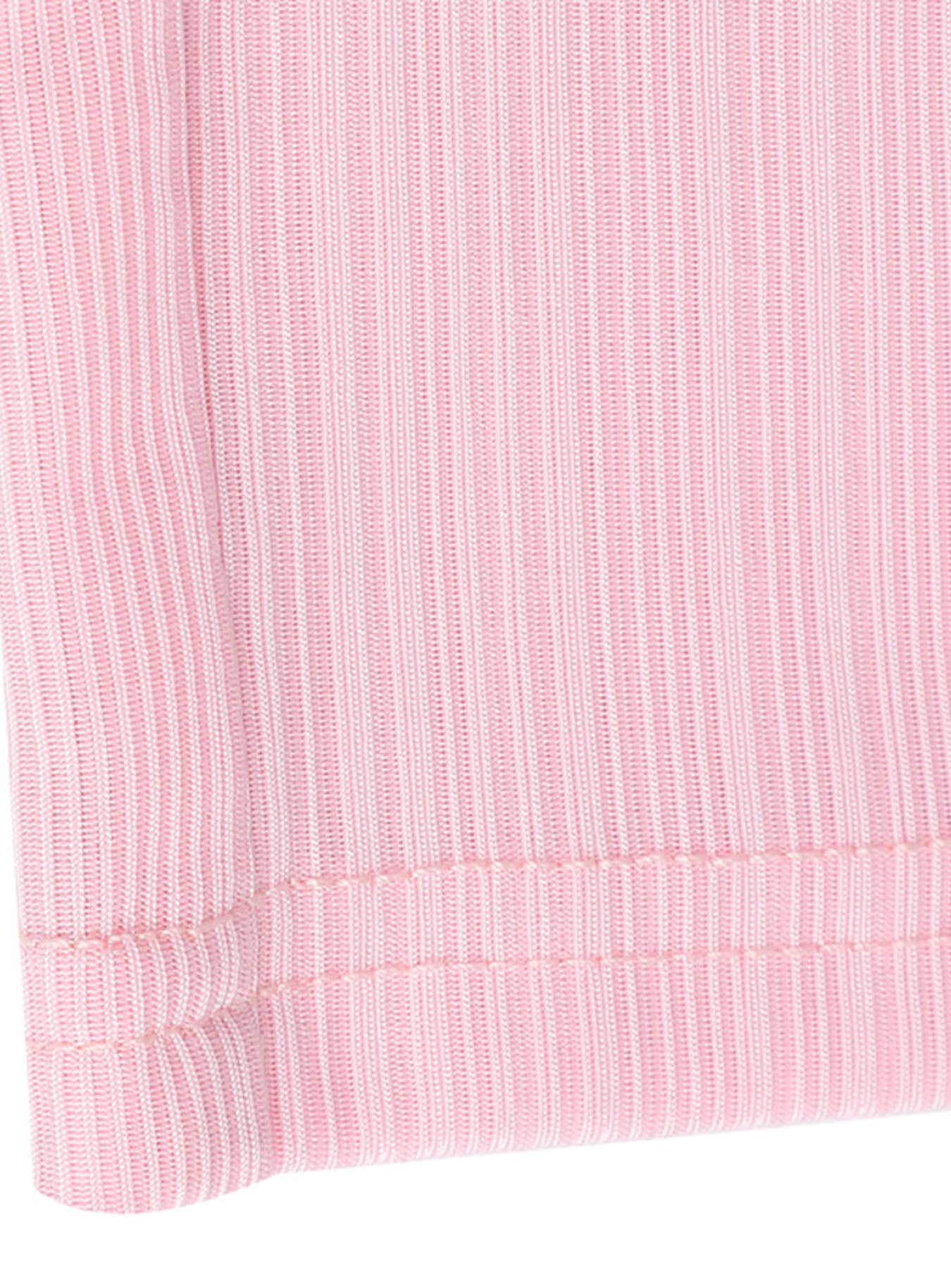 Close-up of a pink textured fabric with a white background