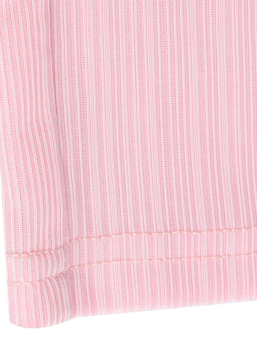 Close-up of a pink textured fabric with a white background