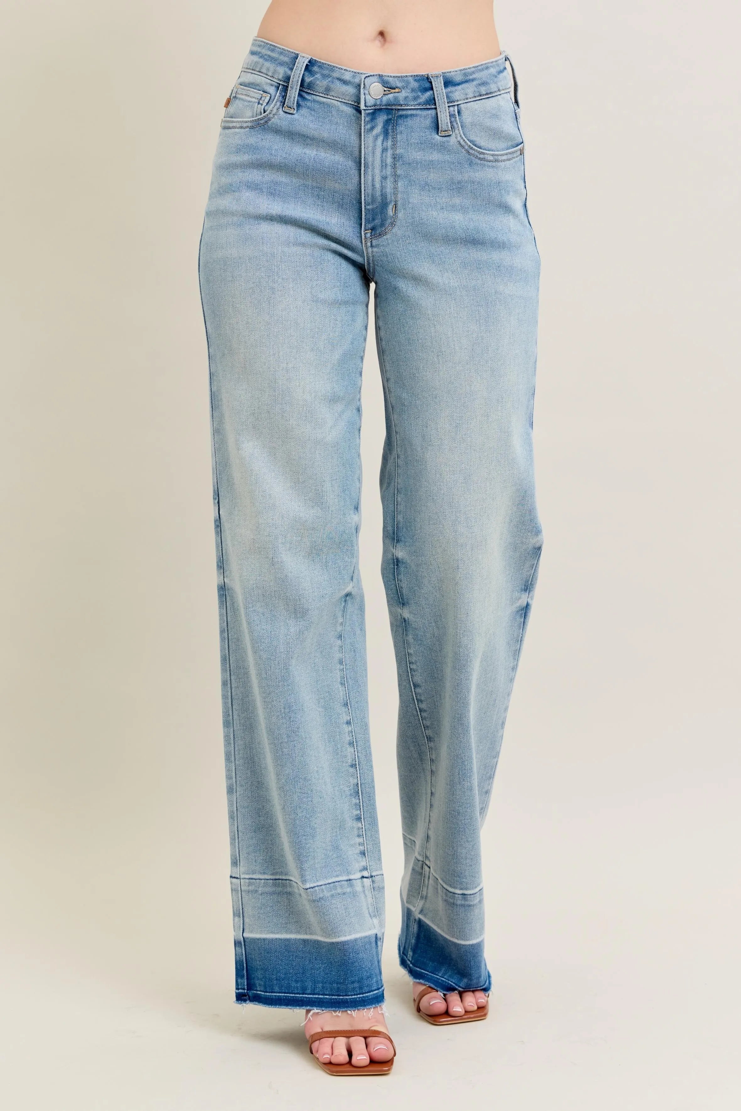 Light blue jeans with a white background