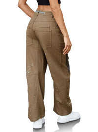 Brown cargo pants worn by a person on a white background