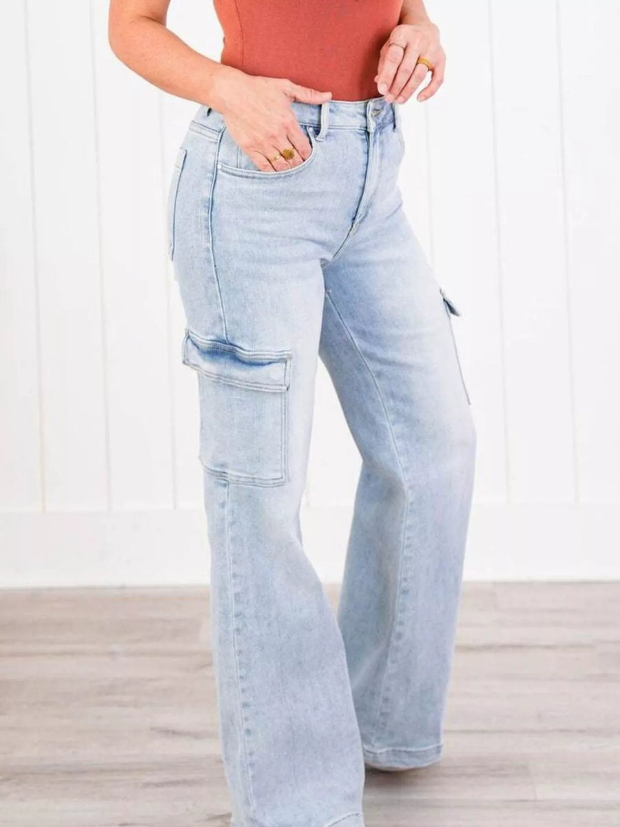 Light blue jeans worn by a person on a white background