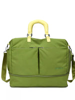 Green bag with yellow handle on a white background